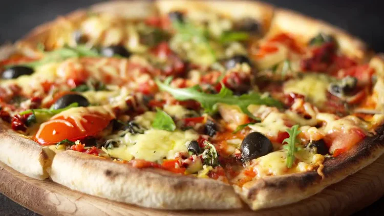 دانلود ویدیو استوک Fresh Pizza With Cheese And Olives